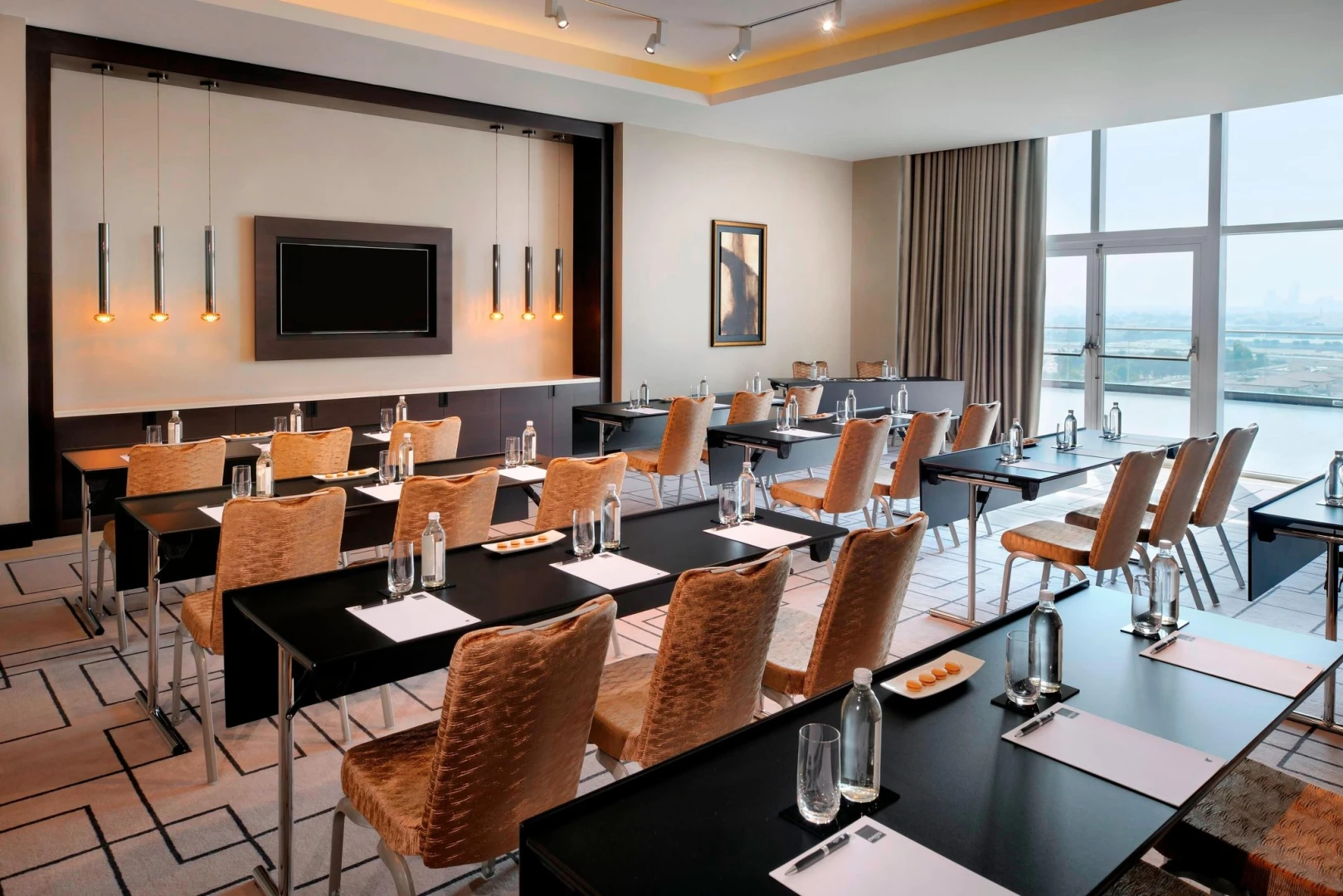 Conference room at JW Marriott Marquis Hotel Dubai with city view.