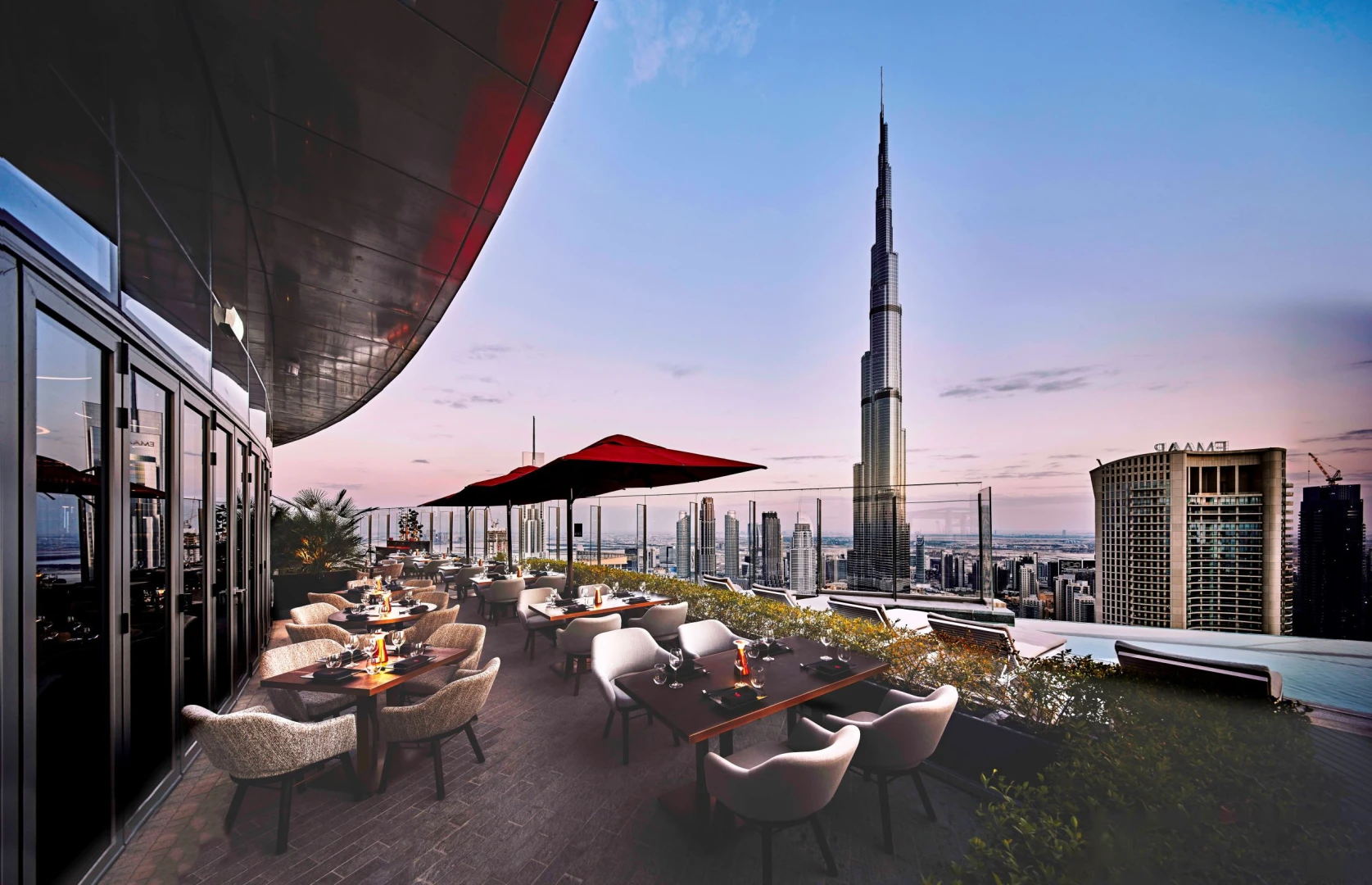 CÉ LA VI Dubai terrace with Burj Khalifa view at sunset.