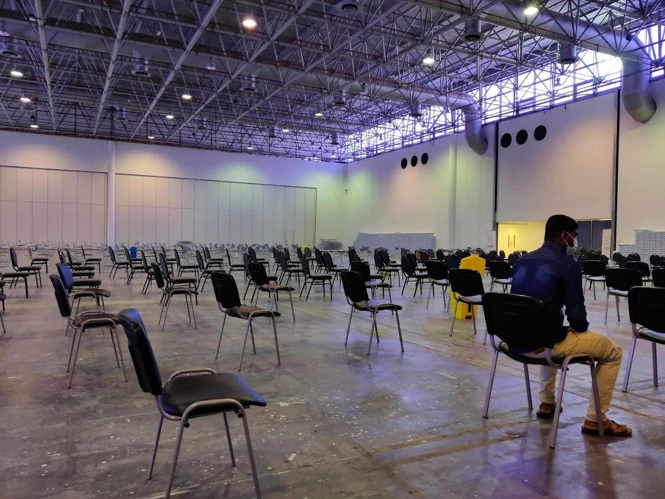 Spacious hall with distanced chairs, Expo Centre Sharjah, Sharjah.