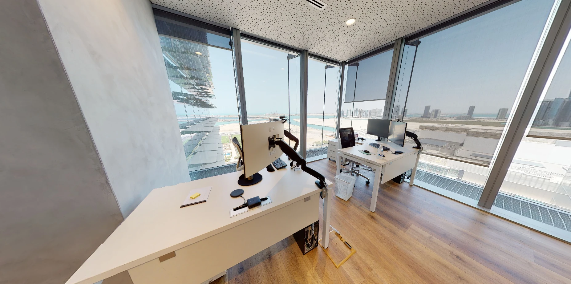 Modern office space at Cloud Spaces ADGM, Abu Dhabi with city view.