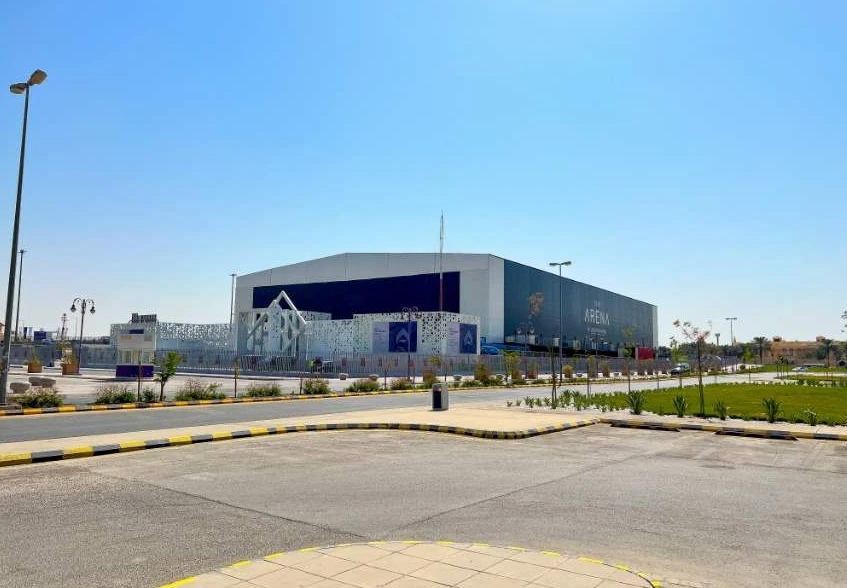 The Arena Riyadh Venue for Exhibitions, modern exterior, clear blue sky.