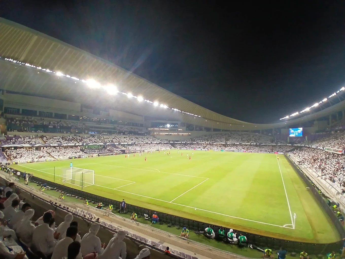 Night soccer match at Zayed Sports City, Abu Dhabi stadium.