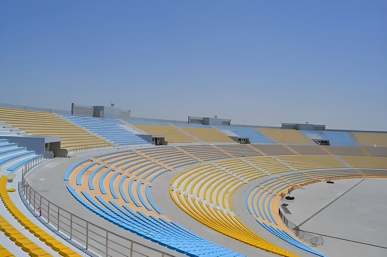 Empty Asian Town Amphitheater seating under clear sky, Doha