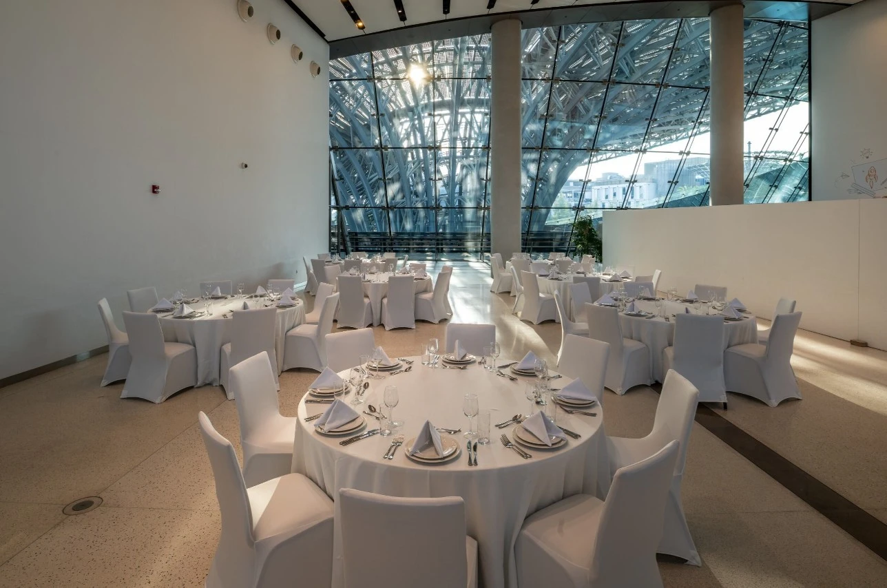 Sophisticated dining area with round tables, Innovation Gallery, Expo City Dubai.