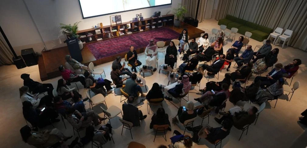 Jax District Riyadh venue with attendees seated in a circle, Dubai.